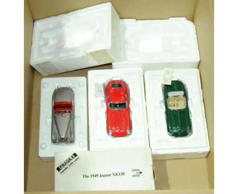 Franklin Mint &amp; Danbury Mint. A group of boxed/part boxed 1:24 scale Jaguar models comprising of Danbury Mint 1949 Jaguar