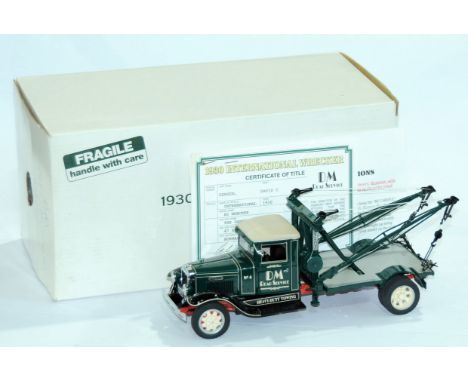 Danbury Mint. A boxed 1:24 scale 1930 International Wrecker complete with certificate. model appears Good although not checke