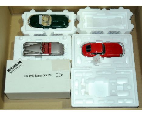 Franklin Mint &amp; Danbury Mint. A group of boxed/part boxed 1:24 scale Jaguar models comprising of Danbury Mint 1949 Jaguar