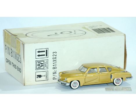 Franklin Mint. A boxed 1:24 scale limited edition B11XG23 50th Anniversary Edition 1948 Tucker in limited edition Gold with c