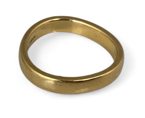 A Georg Jensen 18ct gold wedding ring
The band of undulating design,&nbsp;marked G.J Ld, '750' and G.J cypher, London hallmar