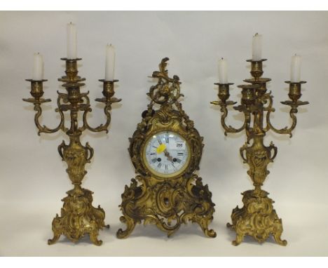 AN EVREUX ORNATE GILT BRASS MANTLE CLOCK GARNITURE 