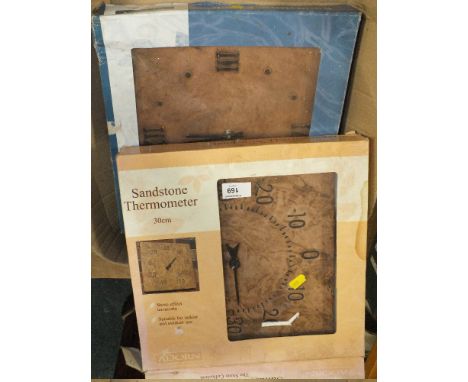 A BOXED OUTDOOR CLOCK AND THERMOMETER 