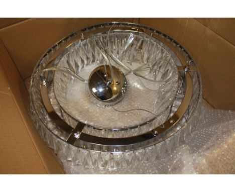 A MODERN GLASS CEILING LIGHT