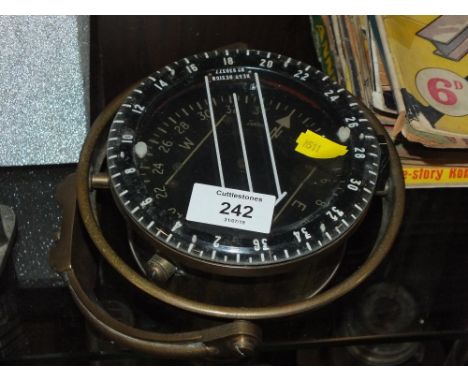 A VINTAGE BRASS NAVAL STYLE COMPASS 