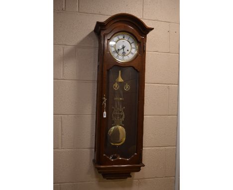 A MODERN MAHOGANY WALL CLOCK, signed AMS, Roman numerals, approximate height 105cm (winding handle)