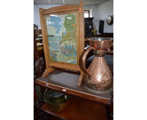 AN OAK FRAMED FIRESCREEN, with needlework detail, walnut overmantle mirror, copper flagon, copper filter, brass jug, etc (6)