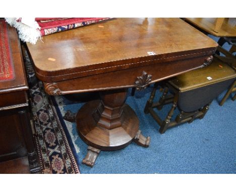 A VICTORIAN MAHOGANY RECTANGULAR FOLD OVER CARD TABLE, with baize lined interior on an octagonal pillar, circular platform on