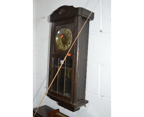 AN OAK WALL CLOCK (winding key) and a modern barometer (2)