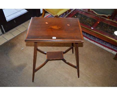 AN EDWARDIAN MAHOGANY AND INLAID FOLD OVER CARD TABLE, with shell inlay detail on square tapering legs united by a stretcher 