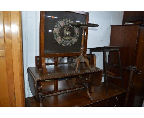 A MAHOGANY SOFA TABLE, a mahogany occasional table, a mahogany firescreen, a Victorian mahogany curtain rail and a wine table