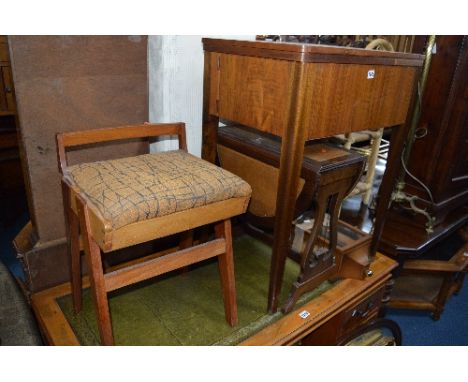 A WALNUT CASED ELECTRIC SEWING MACHINE, on legs, teak dressing stool, two other stools, a mahogany drop leaf occasional table