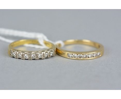 TWO 18CT GOLD HALF ETERNITY RINGS SET WITH DIAMONDS, ring size K & M, approximate weight 5.6 grams