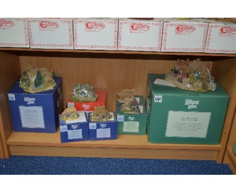 SEVEN BOXED LILLIPUT LANE SCULPTURES FROM THE ENGLISH COLLECTION, to include 'Oakwood Smithy' 616, 'Gossip Gate' 010, 'Puffin