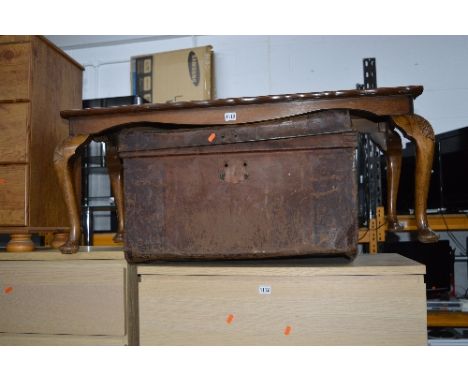 A VINTAGE TIN TRUNK AND A WALNUT COFFEE TABLE (2)