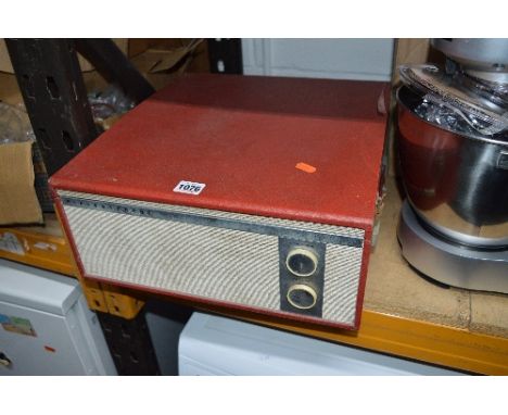 A MID CENTURY MARCOMPHONE RECORD PLAYER, in red with a Garrard turntable