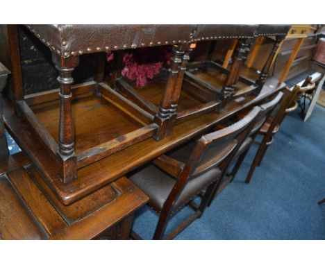 AN OAK REFECTORY TABLE, approximate size width 183cm x depth 76cm x height 74cm and five dining chairs with brown leather sty