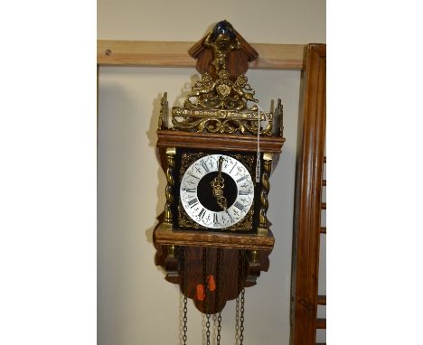 A CONTINENTAL WALL CLOCK, signed Wuba, Roman numerals (two weights)