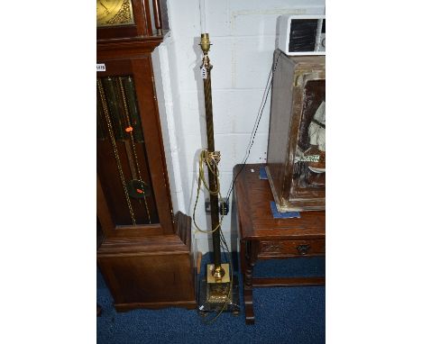 A BRASS STANDARD LAMP, on a square black marble base, approximate height 136cm