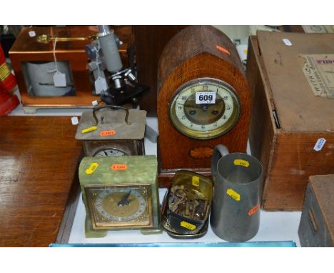 THREE MANTLE CLOCKS, to include a Kienzle, an Elliott Onyx timepiece and another marked Paris, together with a tin of clock k