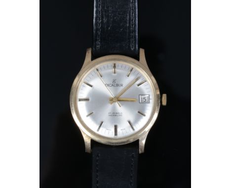 A gentleman's Excalibur 9ct gold cased manual wristwatch with satin dial, baton markers, centre seconds and date display.Cond