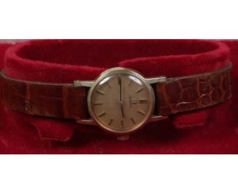 A ladies 9ct gold cased Omega manual wristwatch in original box with gold dial and applied baton markers Cal. 625.