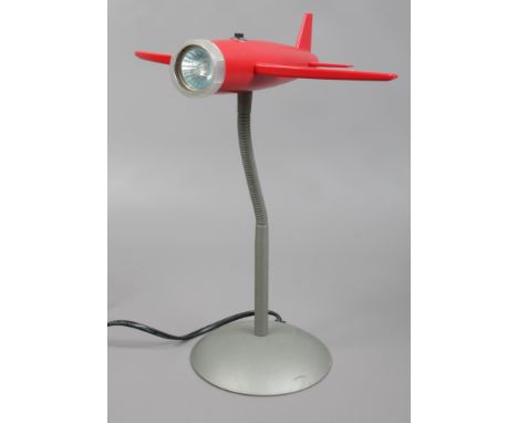 A childs novelty aeroplane desk lamp.