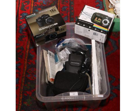 A box of cameras and camera equipment including boxed Fujifilm Finepix 52500 HD.