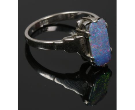 An Art Deco 9ct white gold ring set with an opal doublet, size M.