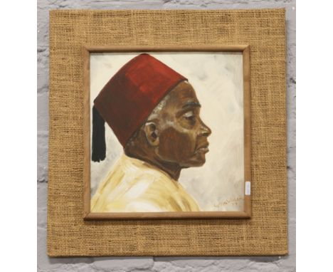 Lynne Williams (British C20th) framed oil on board, portrait profile of a Moroccan man wearing a fez, signed and dated 77.