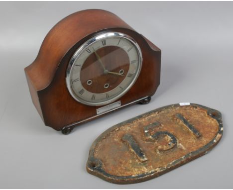 Railway interest; a cast iron engine plate, along with an oak Westminster chime mantle clock with British Rail presentation p