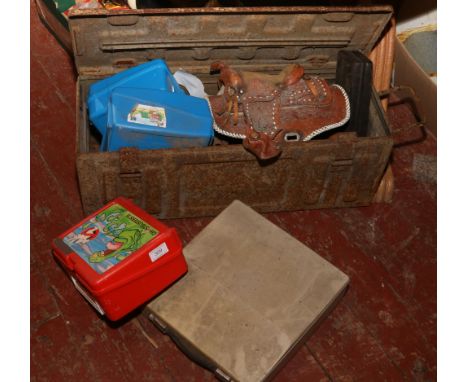 A military steel ammo box and contents of leather hand bag formed as a saddle, chisels, sharpening stove childrens lunch boxe