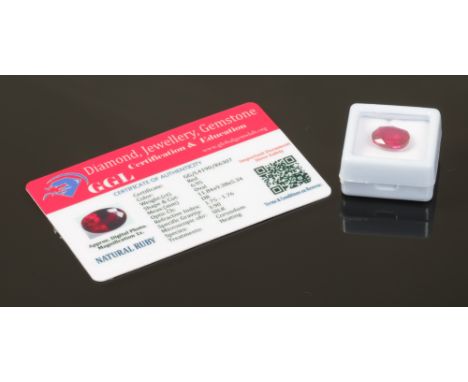 A ruby, oval cut, with heated treatment, 6.95ct with certificate.