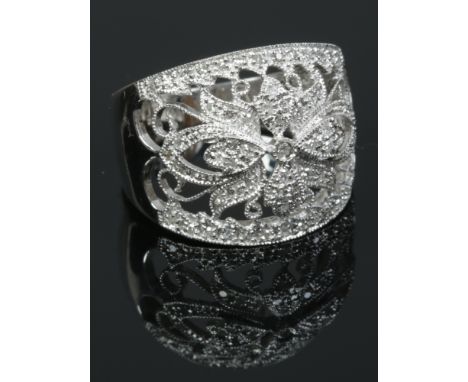 A 14ct white gold garland style diamond ring, size O.