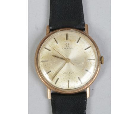 A gentleman's 9ct gold cased Omega Geneve manual wristwatch with satin dial, baton markers and centre seconds, cal. 601.Condi