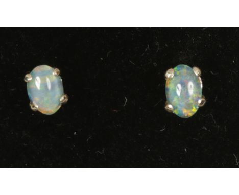 A pair of 9ct gold opal doublet earrings.