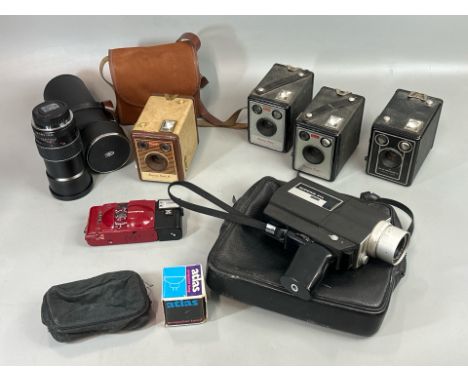 A collection of vintage cameras including a Konica Super 8 - 3TL cine camera, two Kodak Brownie Model 1, Kodak Brownie Flash 