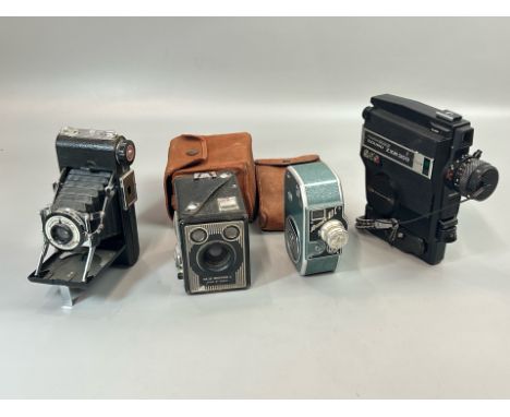 Four old cameras including a 1950's Bauer 88C 8mm cine camera, Fujica ZXM 300 8mm cine camera, Kodak SIX-20 Brownie E and Ker