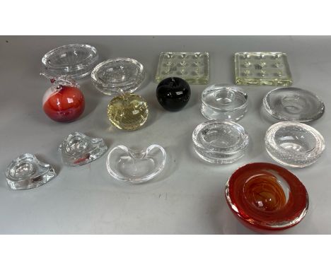 A large collection of contemporary glassware including three  apple shaped paperweights, bowls including a red Kosta Boda bow