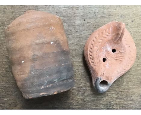 Two Roman Pots, A Late Roman North African Grave Offering Decorated Samian oil lamp. Approximately 13cm long and 5cm high & a