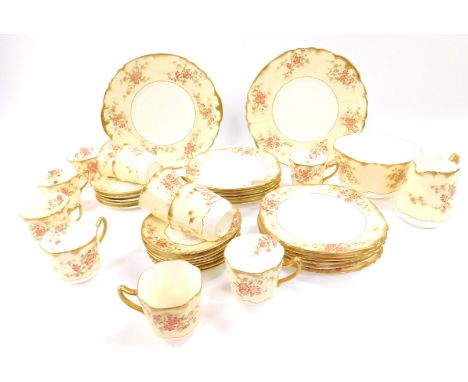 A late 19thC Staffordshire porcelain tea service, printed and painted with flowers against a yellow ground, gilt heightened, 