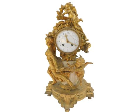 A late 19thC French ormolu and marble mantel clock by Marti &amp; Cie, circular enamel dial painted with rose garlands, beari