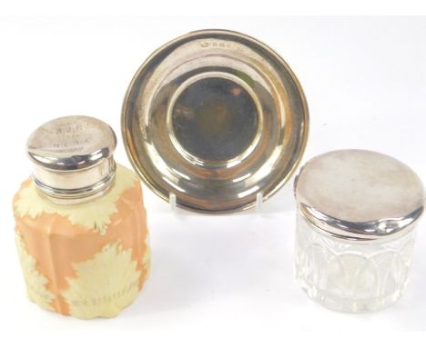 A George V cut glass toilet jar with silver lid, Birmingham 1931, Edward VII silver dish or card salver, Birmingham 1905, and