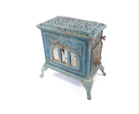 Le Select - A late 19thC / early 20thC French teal enamel log burning stove by Poele a Bois, Pardon de Paris, the pierced and