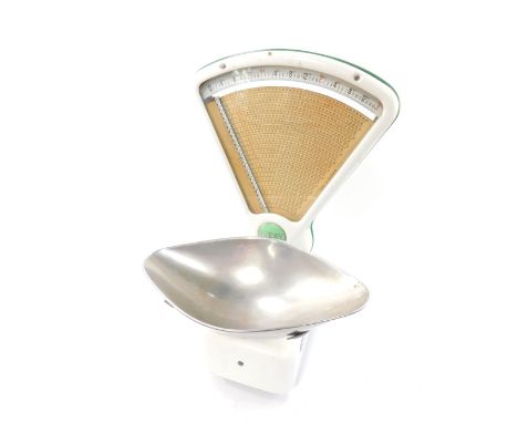 A set of early 20thC Avery white and green enameled kitchen scales, to weigh up to 3lbs, 59cm H. 