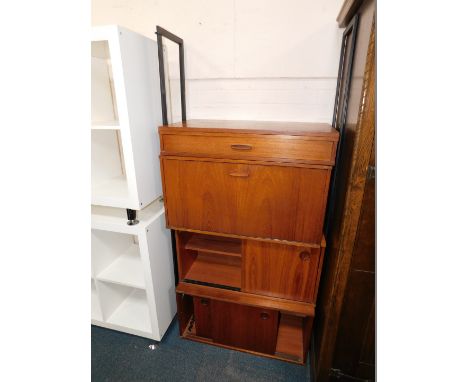 A late 20thC Avalon teak and black metal wall mounted shelf stacking system, having two cupboards with pairs of sliding doors