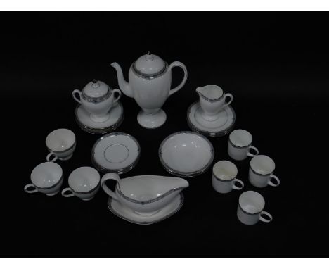 A Wedgwood porcelain part coffee service decorated in the Amhurst pattern, comprising coffee pot, sucrier, cream jug, four ca