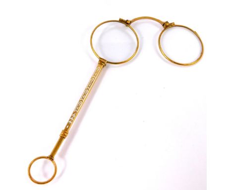A pair of late 19thC Continental lorgnettes, gilt metal and champleve white enamel decoration, 14cm L.
