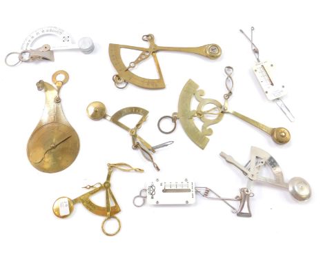A J Cooke &amp; Sons brass swan neck pocket postal scales, further pocket scales by Perry &amp; Company, and others. (9)