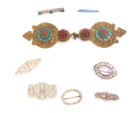 An Art Deco green and white paste brooch, a 19thC Georgian paste buckle, Art Deco paste clips, and a Continental brass enamel
